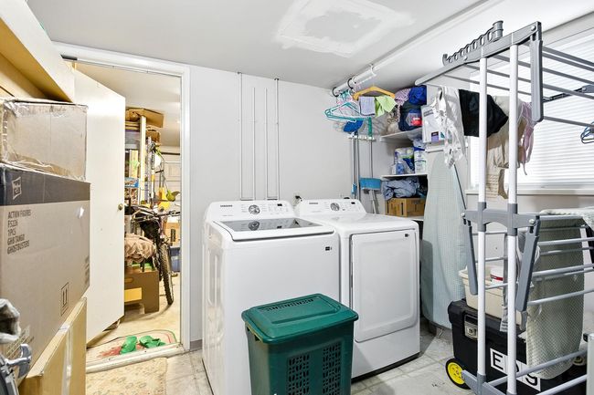 Washroom with washer and clothes dryer | Image 23