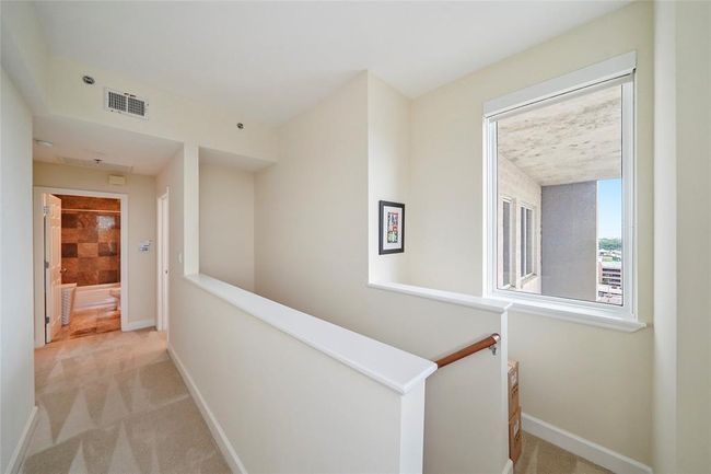 Bright second floor hallway. | Image 31