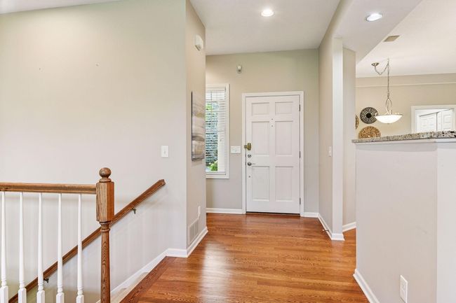 Step inside to a light-filled, open-concept layout. | Image 38