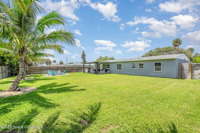 Backyard Oasis with Outdoor Kitchen/ Grilling Area with Propane Grill & Sink, Paved Firepit Seating Area, and Patio with NEW Patio Roof Covering (2025) | Image 5
