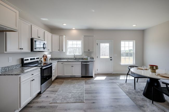 CHEF'S KITCHEN w/ Upgraded Cabinetry + Full Granite Package | Image 9