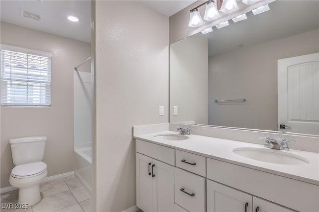 Upstairs hall bath with double sinks | Image 27