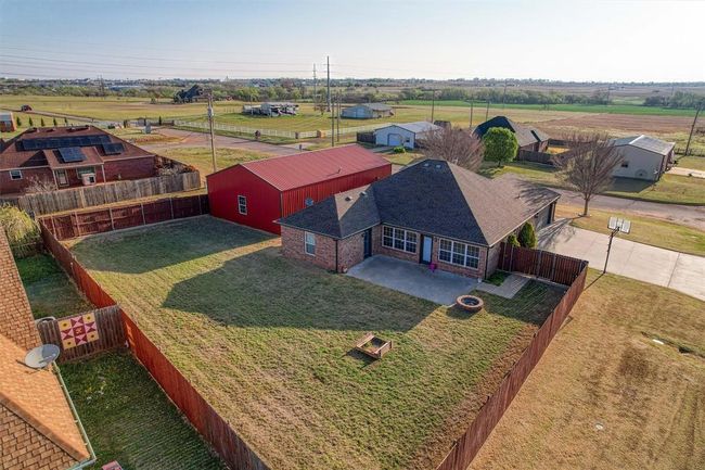 Aerial from the West, large backyard. Privacy Fence. | Image 37