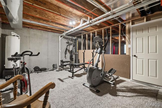 Workout room featuring water heater | Image 31