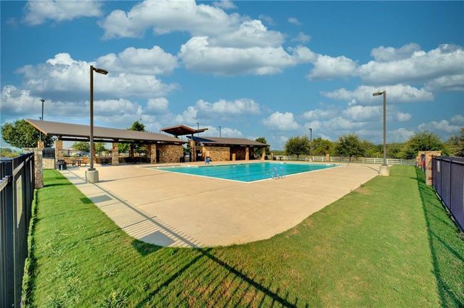Community pool with a gazebo and a patio | Image 26