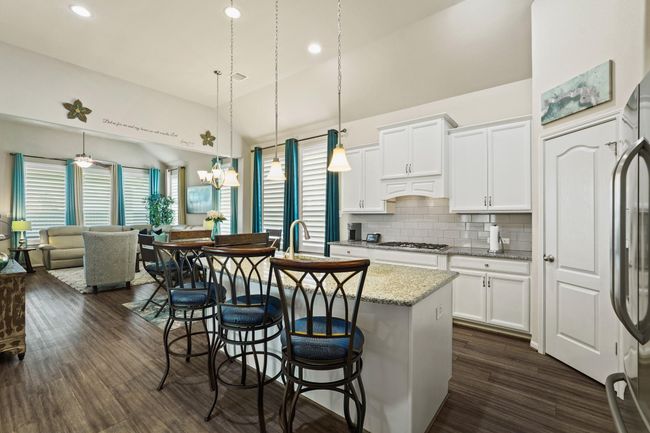 This home offers versatile living, from the potential for an open-concept kitchen and living area, to adaptable bedrooms, a spa-like bathroom, and seamless indoor-outdoor flow leading to an expansive patio. Every space is a canvas for personalized design and function. | Image 6