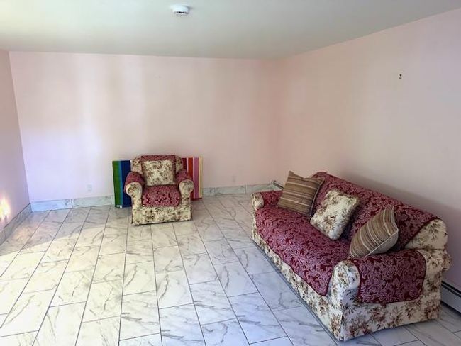 View of living area | Image 28
