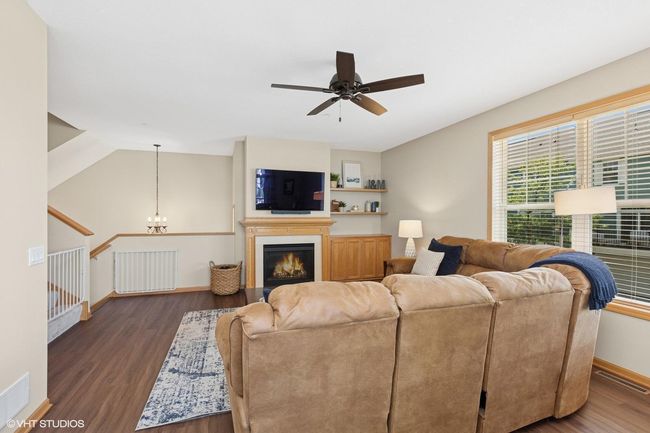 Cozy gas fireplace for those colder days and ceiling fan for the warmer days | Image 8