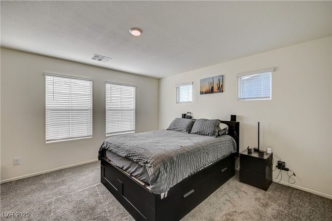 Bedroom featuring carpet | Image 14