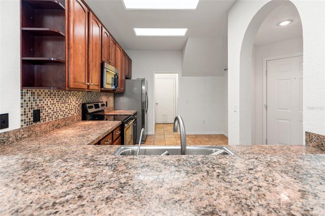 104 - 1936 Heron Cove Dr, Condo with 2 bedrooms, 2 bathrooms and null parking in Lutz FL | Image 7