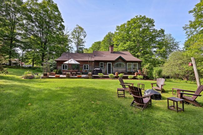 Private backyard with firepit area. | Image 23