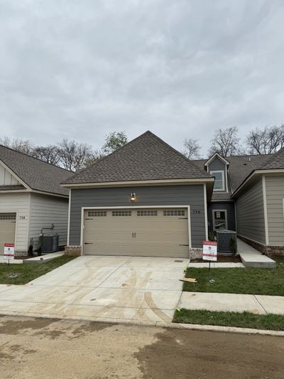 Unit 206 under construction - 2 car garage. | Image 3