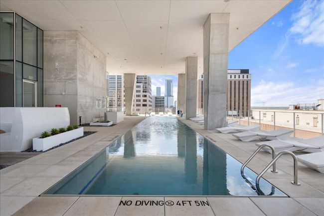 AMENITIES. Elevated amenity deck on the tenth floor includes: Covered Lap Pool, Outdoor Cooking & Dining, Fire Pit Lounge, Sauna, Hot & Cold Plunge Pool, Exercise Facility, Dog Park w/ Washing Station, Conference Room / Private Dining, Club Room w/ Kitchen. Ground floor amenities include 24/7 Concierge, Lobby and two (2) retail spaces. | Image 29