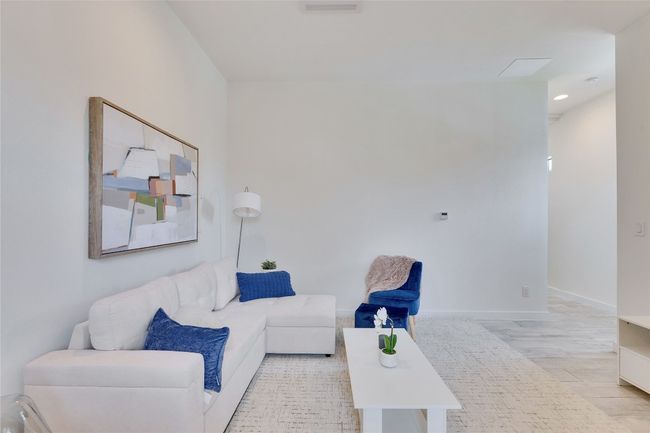 Living room with recessed lighting and baseboards | Image 7