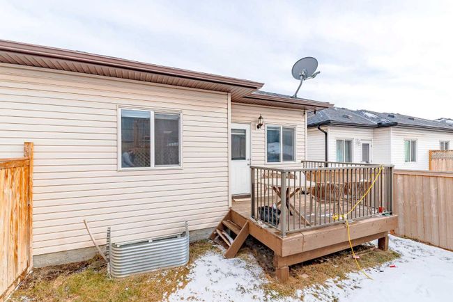 83 Baysprings Way Sw, Home with 5 bedrooms, 3 bathrooms and 2 parking in Airdrie AB | Image 26