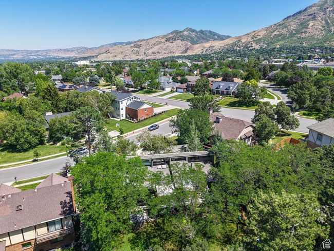 Aerial view of residential area with mountains | Image 83