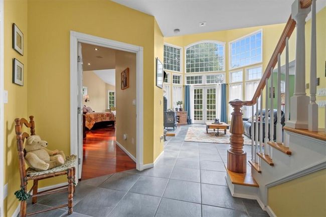 Foyer with entry to Primary Room. | Image 9