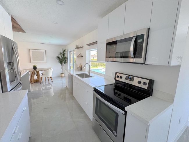 8911 Nw 7 Th Ct, House other with 3 bedrooms, 2 bathrooms and null parking in Pembroke Pines FL | Image 12
