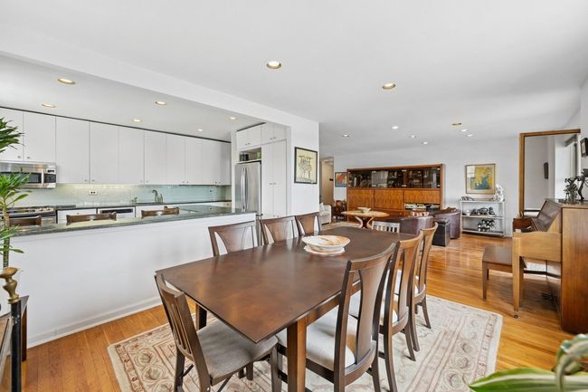 Dining room featuring recessed lighting and light wood-style floors | Image 8