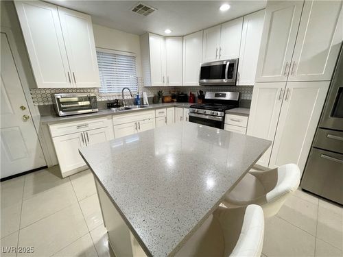 1812 Roosevelt St, North Las Vegas, NV, 89030-6920 | Card Image