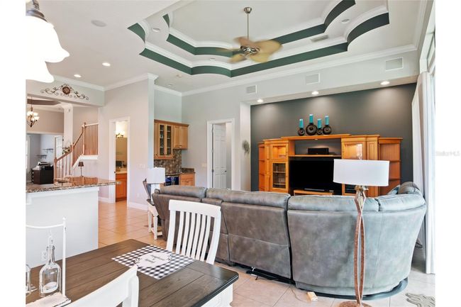 Family Room with wet bar & wine refrigerator. | Image 6