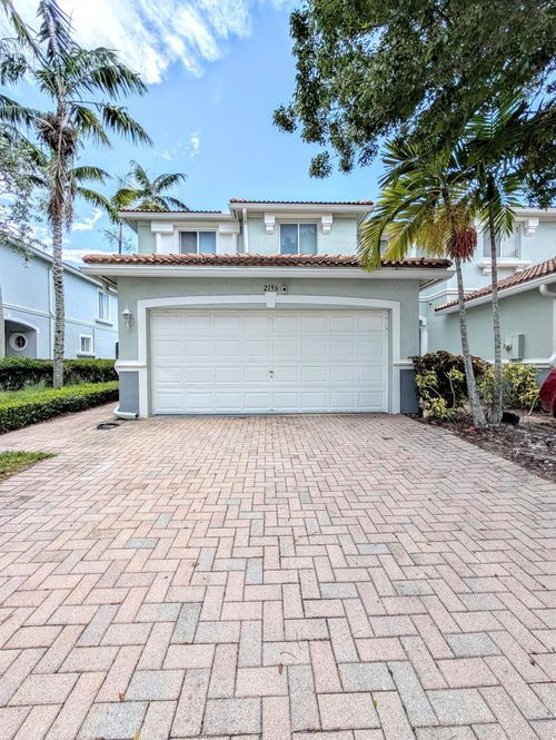2196 Oakmont Dr, Riviera Beach, FL, 33404-1831 | Card Image