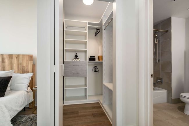 The closet, designed by California Closets, maximizes storage in style. | Image 39