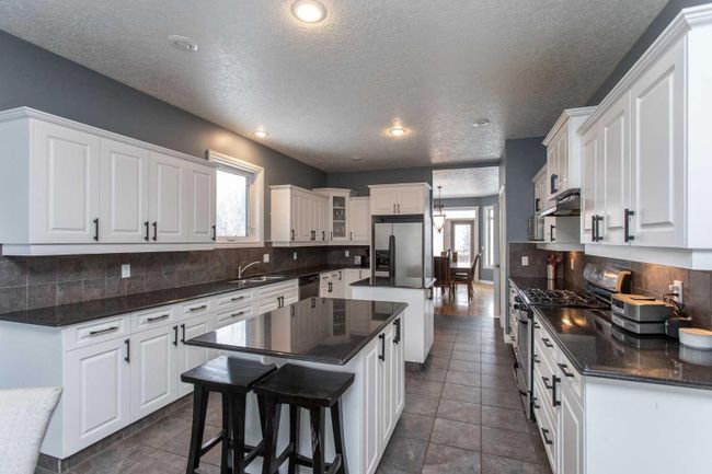 51146 Ab 21, Home with 4 bedrooms, 3 bathrooms and 6 parking in Rural Strathcona County AB | Image 11