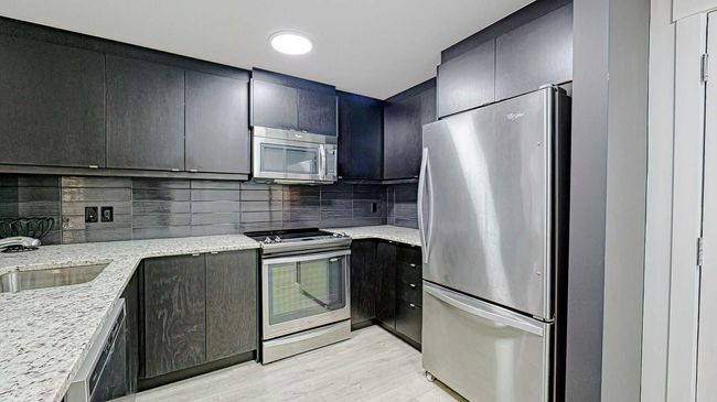 122 - 15 Aspenmont Hts Sw, Condo with 2 bedrooms, 2 bathrooms and 1 parking in Calgary AB | Image 8