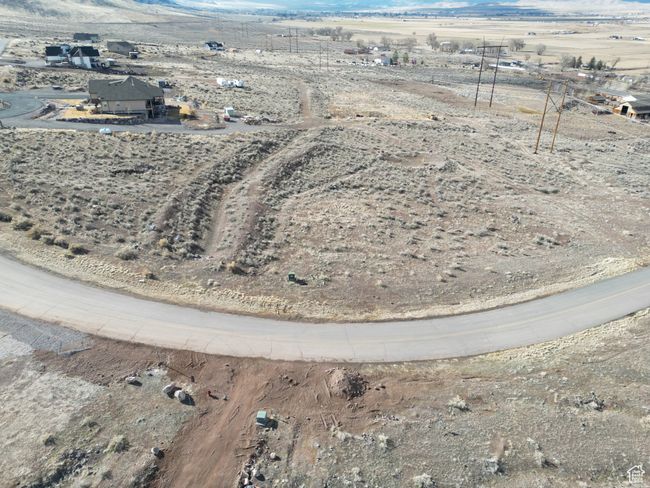 Aerial view of property's location featuring mountains and rural landscape | Image 5