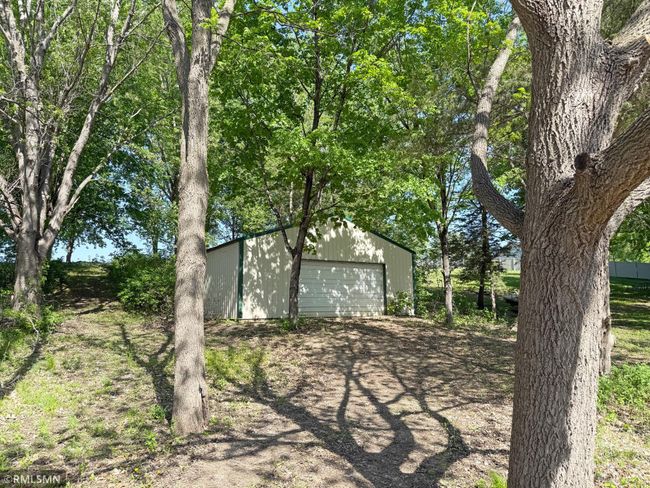 With an additional garage on a back lot, you will have more than enough storage space along with a level lawn. | Image 7
