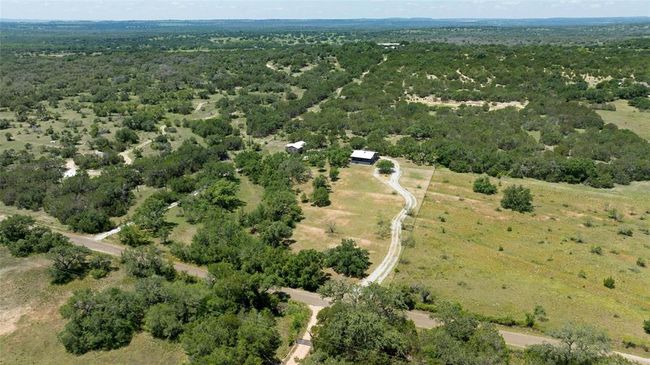 Drone / aerial view featuring a view of trees | Image 35