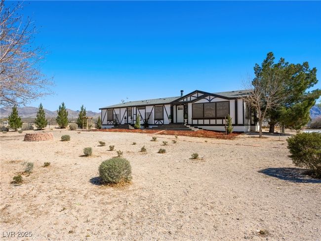 Back of house featuring a mountain view | Image 7