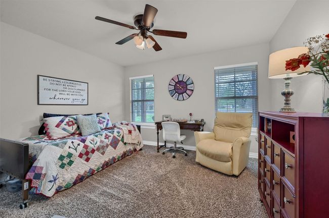 Carpeted bedroom with baseboards and ceiling fan | Image 21