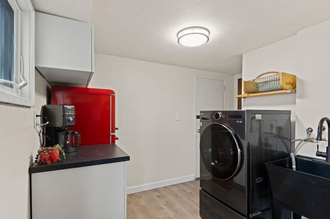 Laundry/Mud room w/ utility sink and LG-HE Smart Mega Capacity All-In-One Washer/Dryer Combo w/ Steam & Ventless Inverter Heat Pump | Image 19