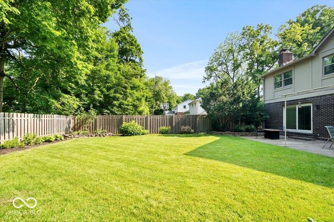 fenced backyard featuring a patio area | Image 37