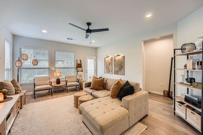 Living area featuring recessed lighting, light wood-style flooring, visible vents, and ceiling fan | Image 8
