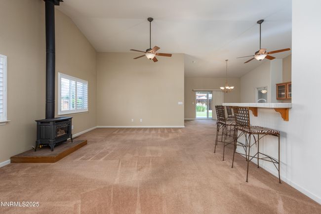 Living room with gas stoe | Image 5