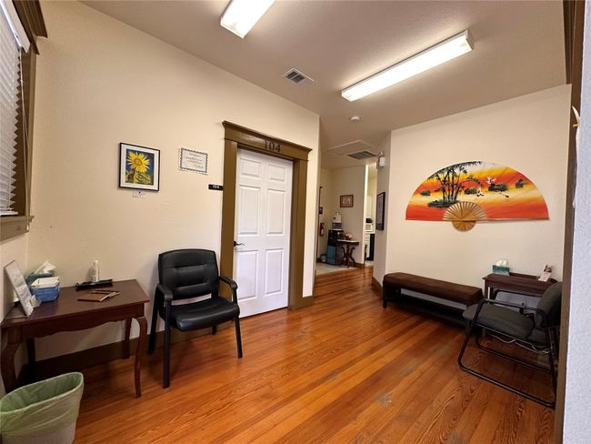 Sitting room featuring light wood-style flooring | Image 20