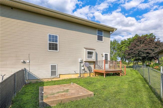 Back of property featuring a fenced backyard and a deck | Image 25