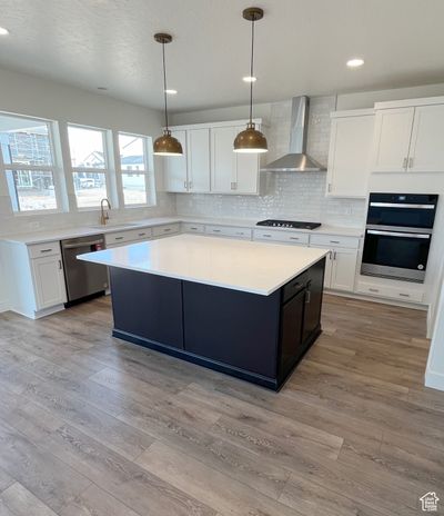 View of front of property with a garage and a porch | Image 2