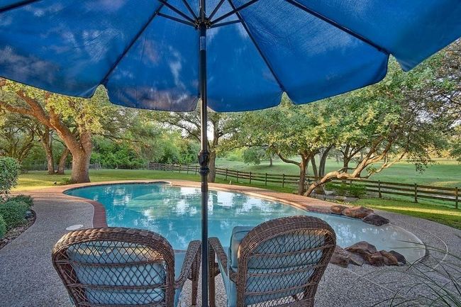 8456 Schuster Rd, Home with 5 bedrooms, 4 bathrooms and 2 parking in Ledbetter TX | Image 4