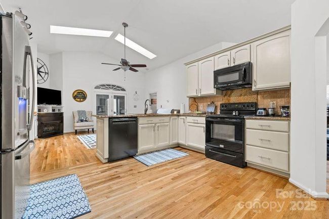 Kitchen over looking family area | Image 16
