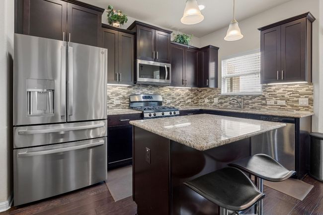 The kitchen comes ready to use with desirable contemporary finishes that are sure to impress the home chef. | Image 4