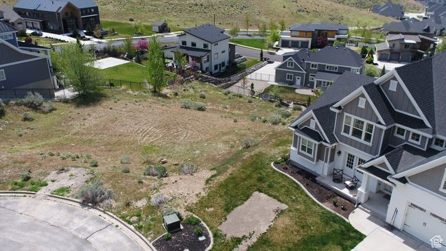 Aerial view of residential area with mountains | Image 4
