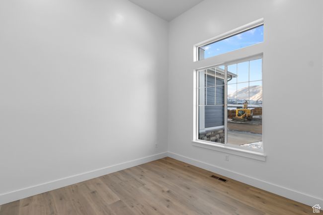 FLEX ROOM W/ LAMINATE HARDWOOD FLOORS...4' RAISED CEILING...IN ADDITION TO THE 9' CEILINGS THROUGHOUT HOME! (PICTURE IS FROM A PREVIOUSLY BUILT HOME) | Image 5