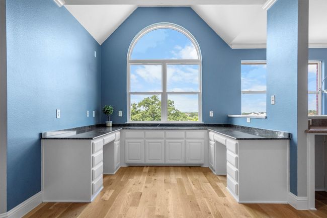 Complete with a dedicated homework nook and a wet-bar area, perfect for entertaining or everyday living. | Image 23