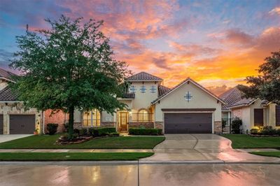 Welcome to your new sanctuary at 15 Edgemont Court, located in the exclusive gated section of The Lakes of Cross Creek. | Image 1