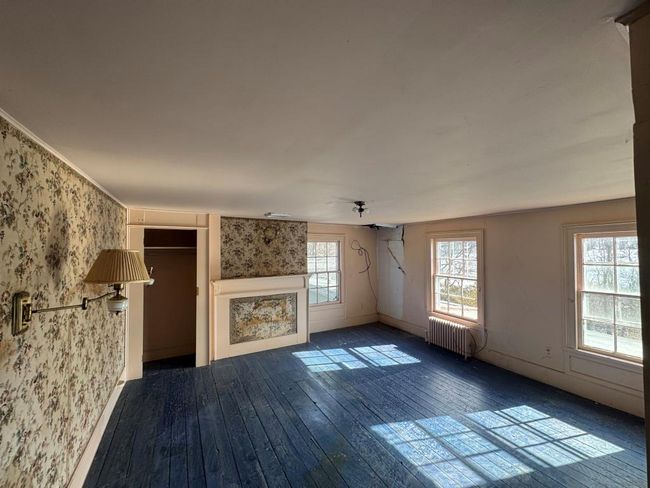 Bedroom with lots of natural lighting. | Image 6