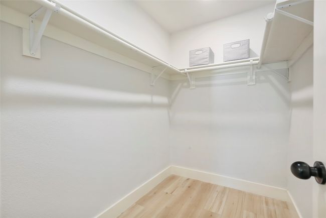 Large Primary Bedroom Walk-in closet | Image 12